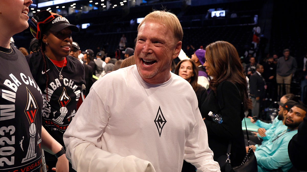 Mark Davis celebrates the Aces championship