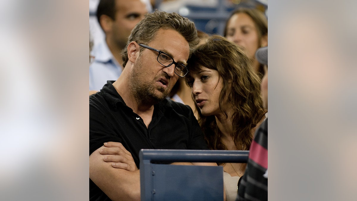 'Friends' star Matthew Perry wanted children of his own after many failed relationships: 'I can't wait' Matthew Perry in a dark collared shirt leans in towards Lizzy Caplan at the U.S. Open