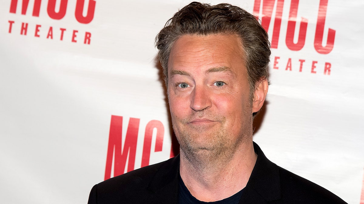 Matthew Perry in black on the carpet in New York
