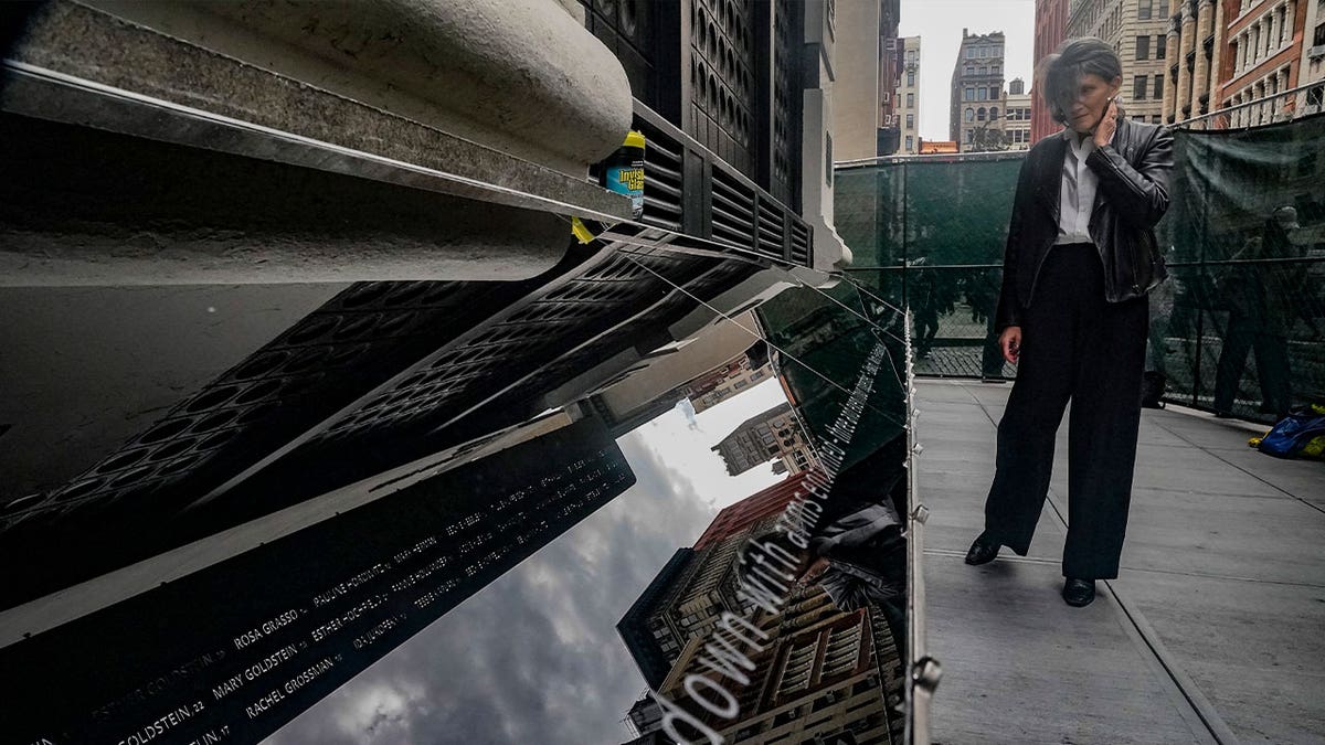 woman visits memorial