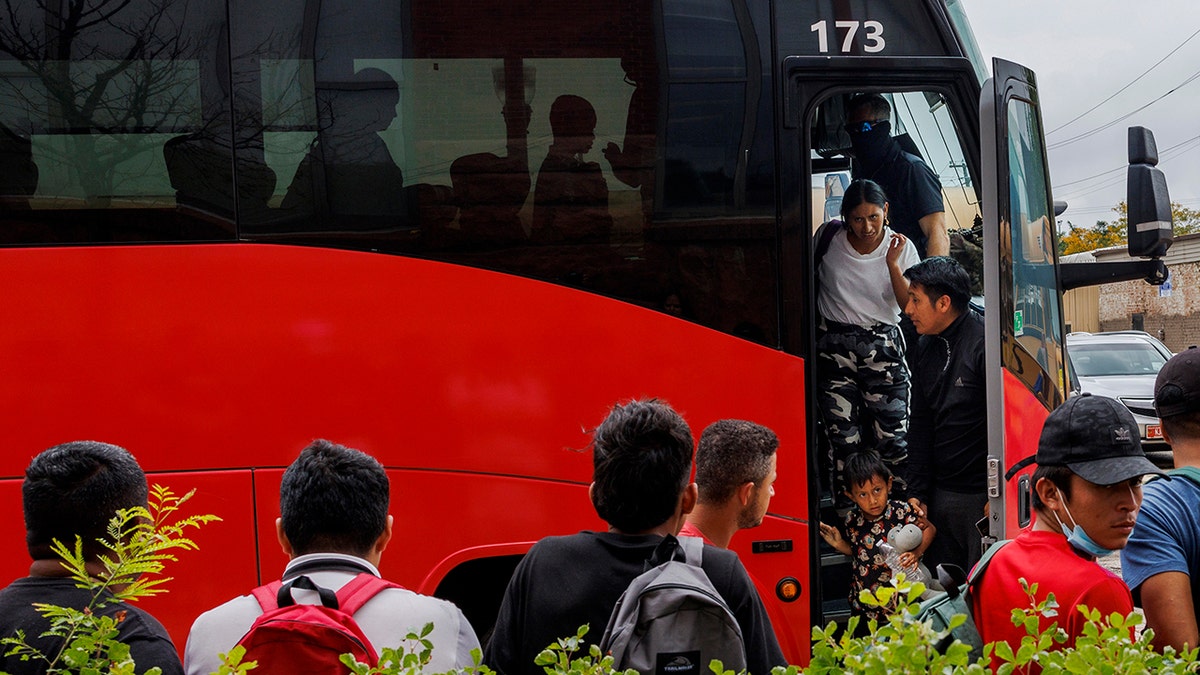 A bus drops off immigrants in Chicago