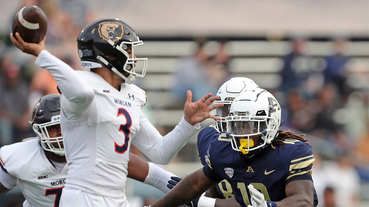 Morgan State quarterback Carson Baker thows a pass