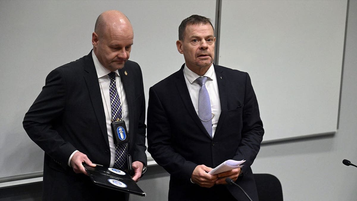 Detective Superintendent Risto Lohi, left, and Director of the National Bureau of Investigation NBI of Finland Robin Lardot attend a press conference on Oct. 11, 2023. NBI is investigating a Balticonnector gas pipeline leak and data cable damage.