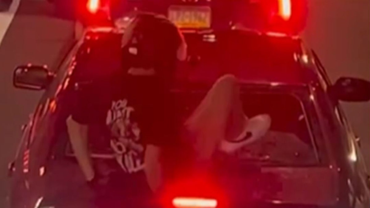 suspect kicking in car windshield