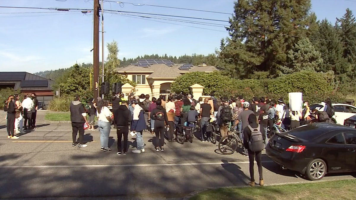 Crowd of protesters gathers outside home in Seattle