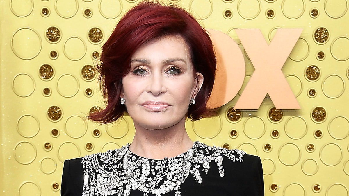 Sharon Osbourne wearing a black dress