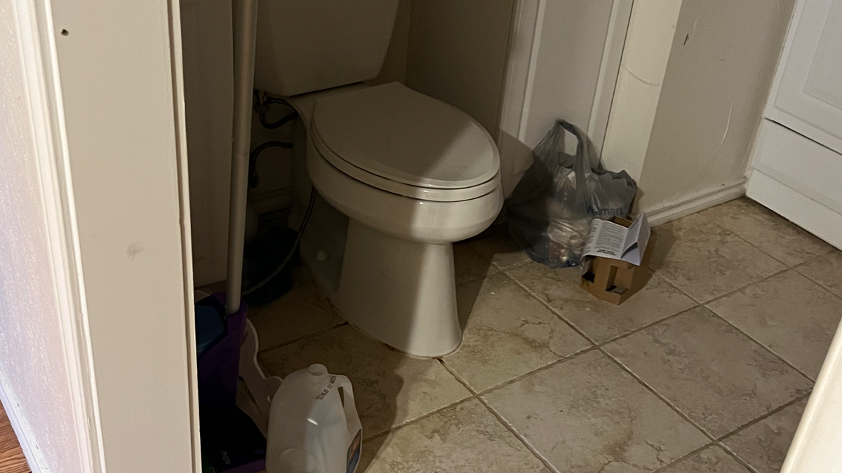 Clogged toilet at squatter house