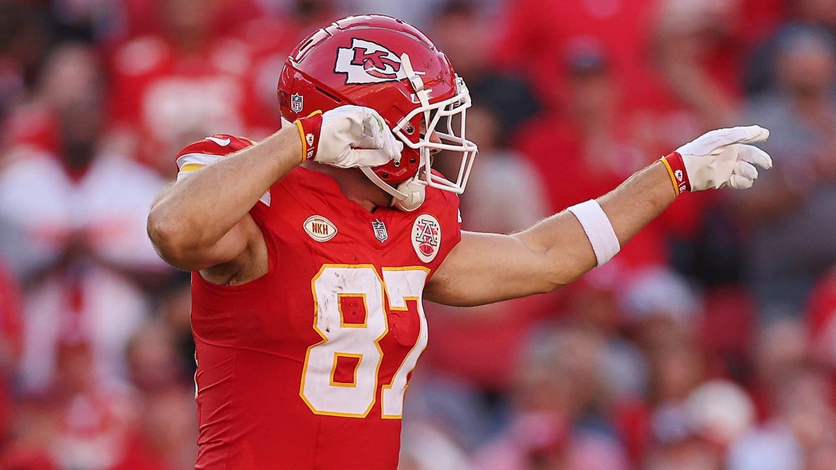Travis Kelce celebrates after a play