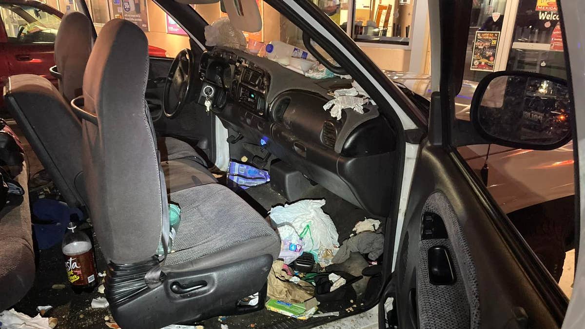 Inside a messy white pickup truck that Trista Fullerton drove after she allegedly abducted her eight biological children from their foster placements.