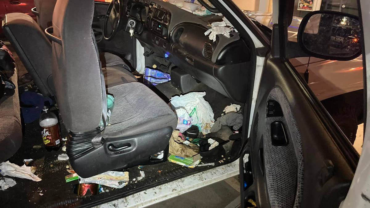 Inside a messy white pickup truck that Trista Fullerton drove after she allegedly abducted her eight biological children from their foster placements.