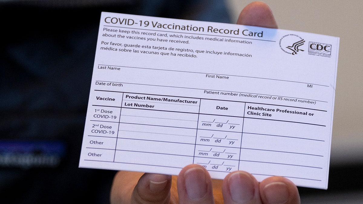 closeup of a vaccination card