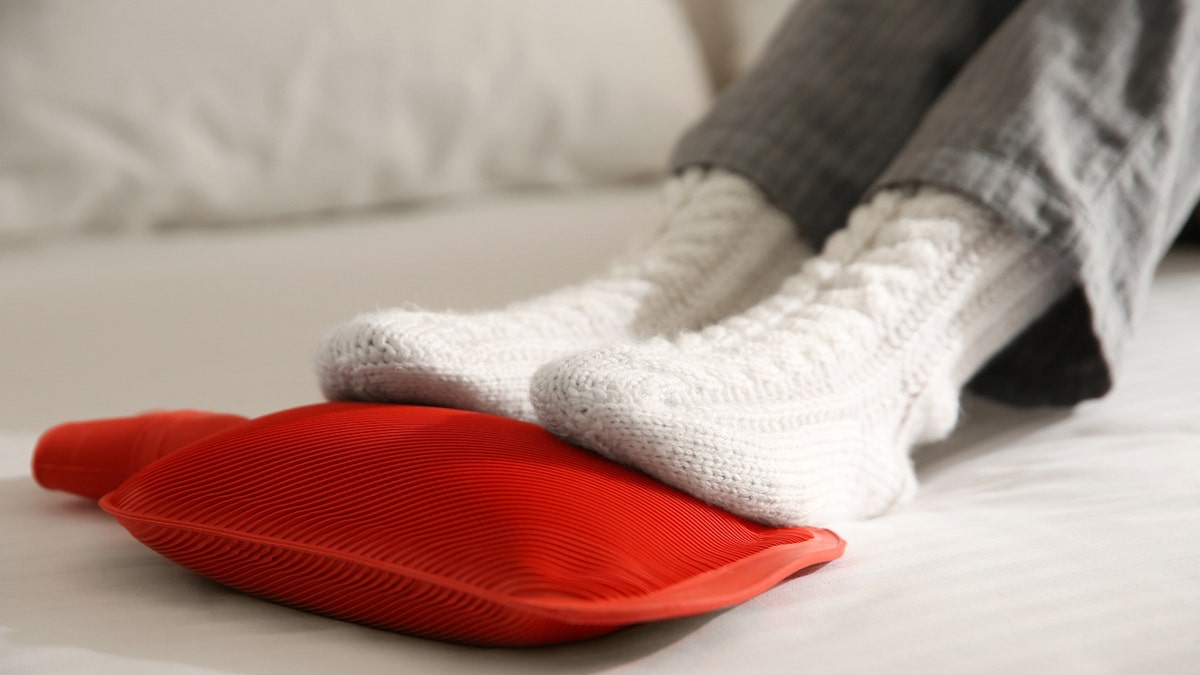 Warming feet in bed