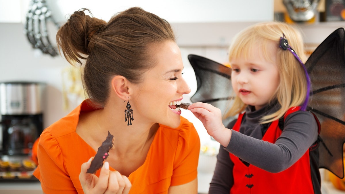 Woman eating candy