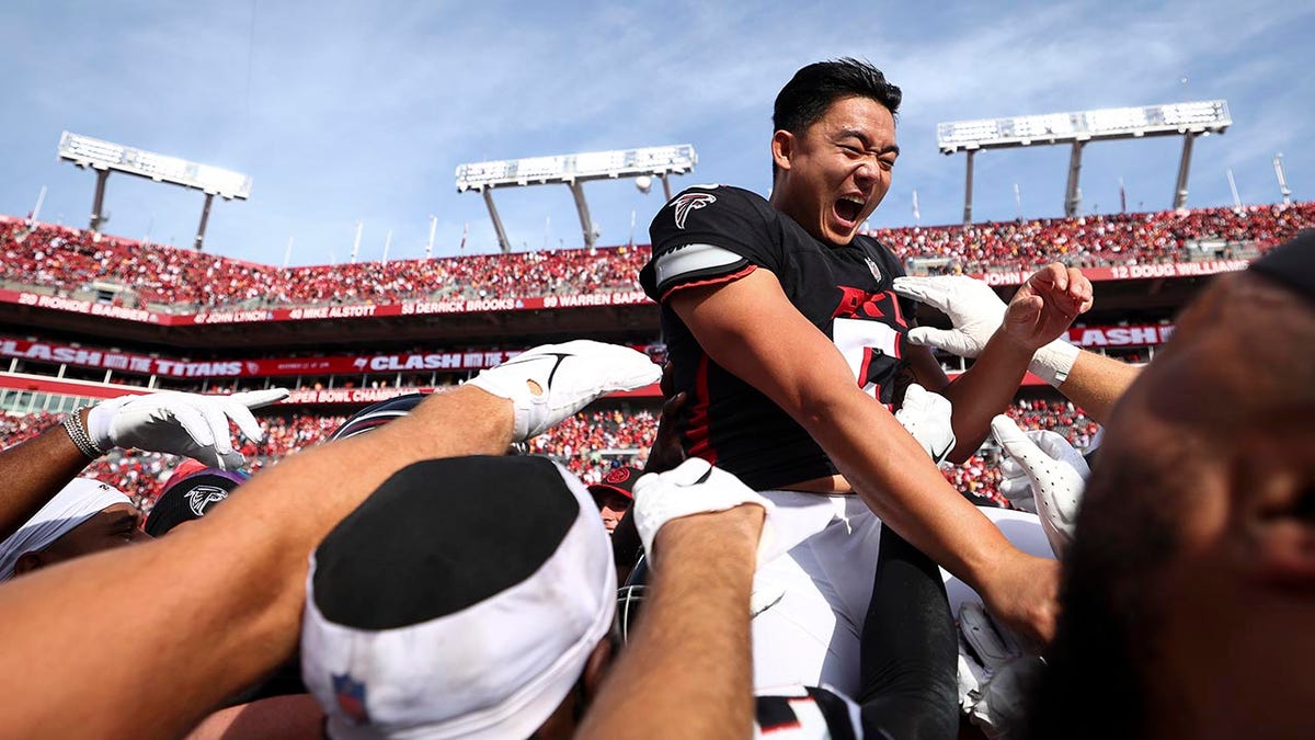 Youngjoe Koo after winning field goal