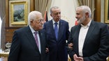 Turkish President Recep Tayyip Erdogan (C) meets with Palestinian President Mahmoud Abbas (L) and Head of the Hamas Political Bureau Ismail Haniyeh (R) at the Presidential Complex in Ankara, Turkiye on July 26, 2023.