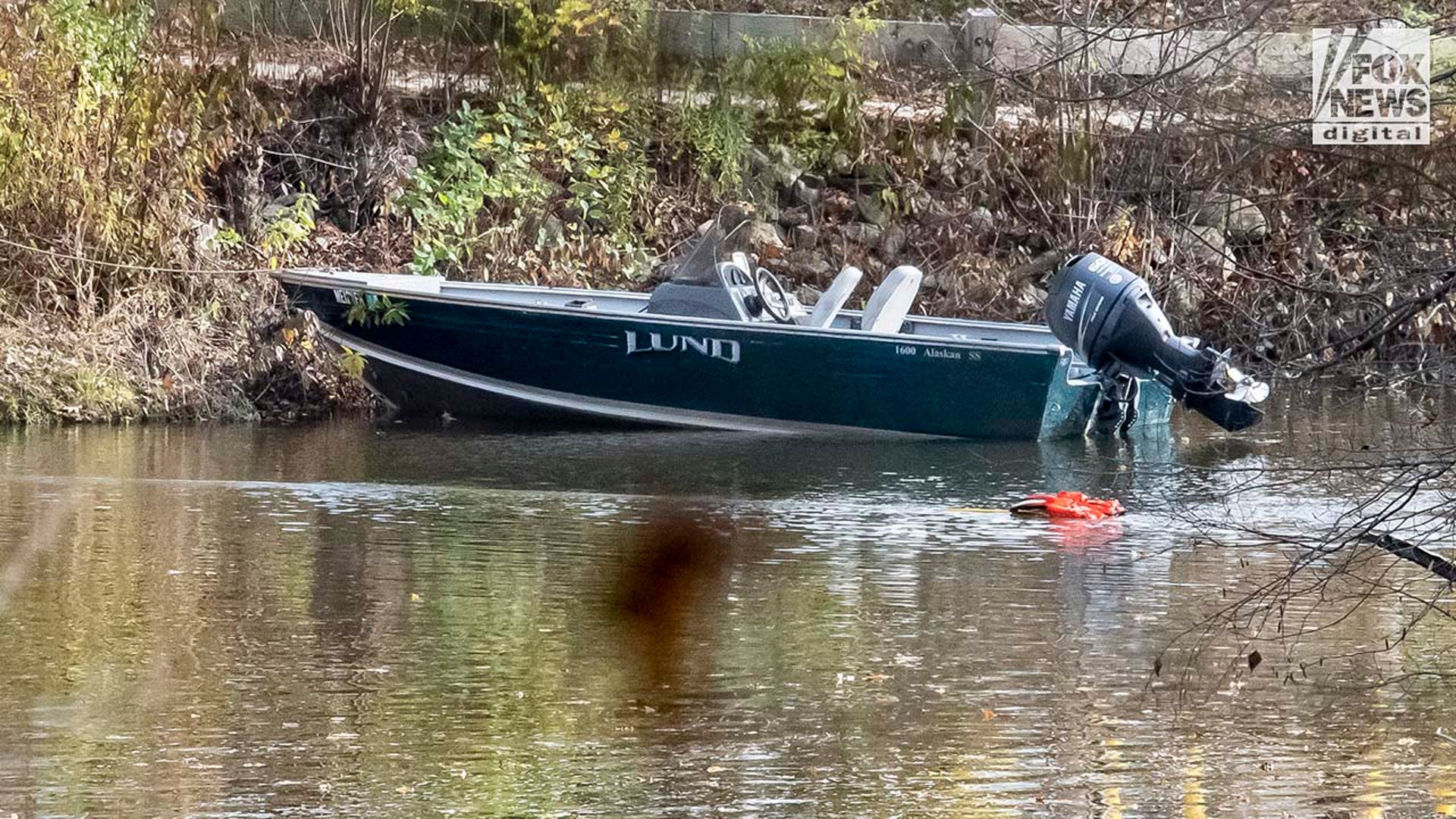 Law enforcement agents aid in the search for Robert Card along the Androscoggin River