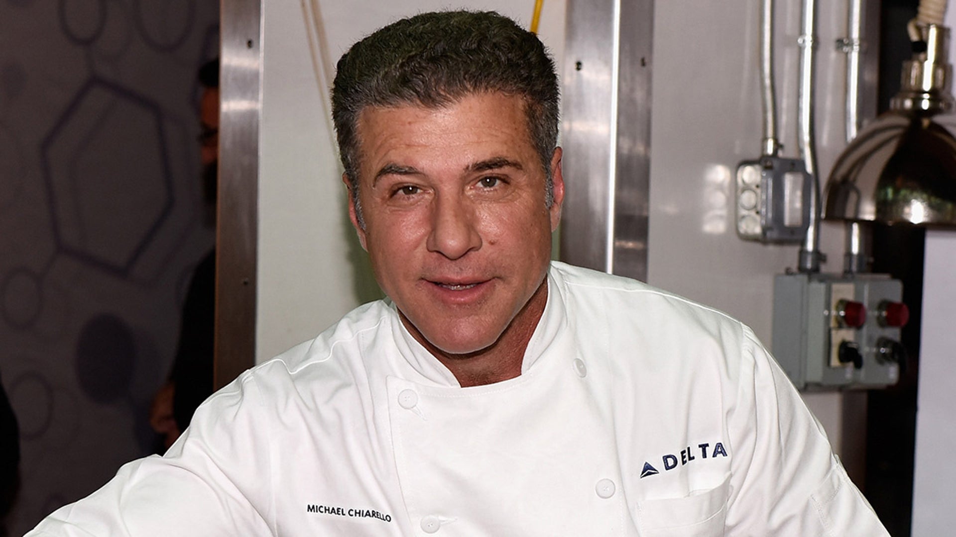 Michael Chiarello in a chef's coat