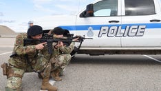 Air Force police open fire on driver attempting to run gate of Texas base