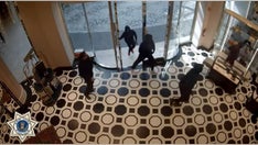 California thieves charge past security guard to steal $50K of merchandise from Gucci store: video