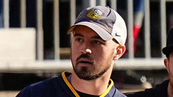 Ousted Michigan staffer has perfect response to Wolverines title win