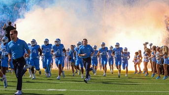 Traditional college basketball powers make noise on gridiron