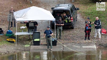 Authorities seen with scuba gear in Maine river during manhunt for Robert Card