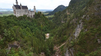 Man charged with murder, other offenses in attack abroad of 2 women near famous castle