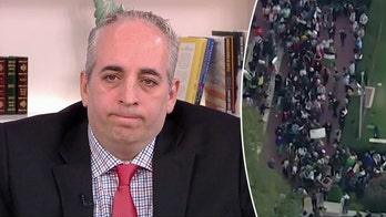 Grandson of Holocaust survivors blames colleges after students protest at vigil for slain Israelis