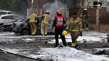 Israel hit with 'huge rocket barrage' as warning sirens blare across country