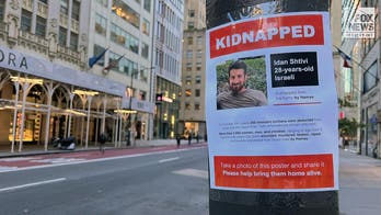 New York Times accused of 'both-siding' pro-Palestinian protestors tearing down posters of kidnapped civilians