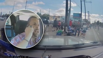 Raging Portland driver rips through rose parade in furious video