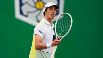 Australian tennis star Marc Polmans disqualified after hitting ball in umpire's face