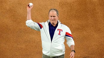 George W. Bush throws out ceremonial first pitch before Game 1 of World Series
