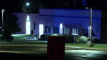 Milwaukee police kill 'erratic' gunman on middle school roof