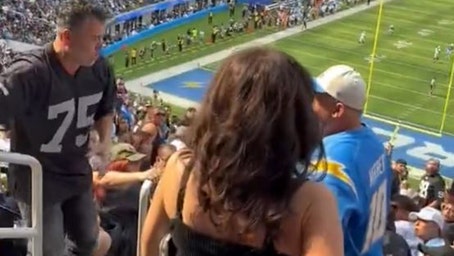 WATCH: Chargers, Raiders fans come to blows during game at SoFi Stadium