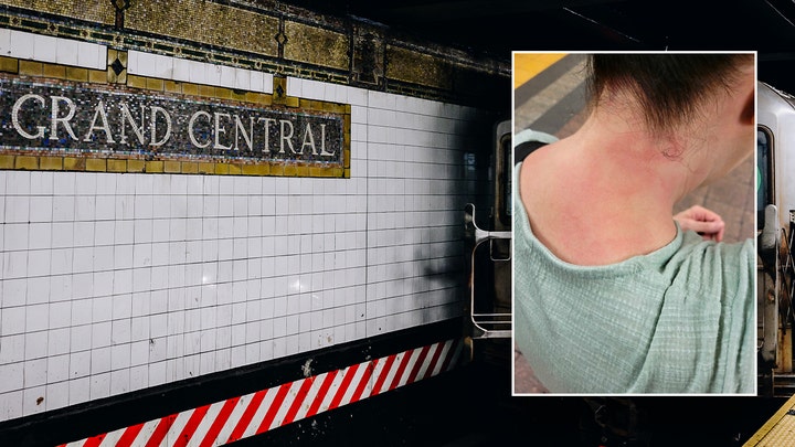 NYC subway shoving suspect pictured leaving through turnstile