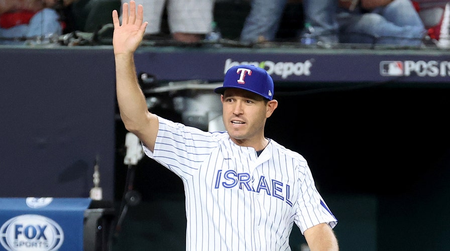 Texas Rangers legend Ian Kinsler wears Team Israel jersey during ceremonial  first pitch in ALCS