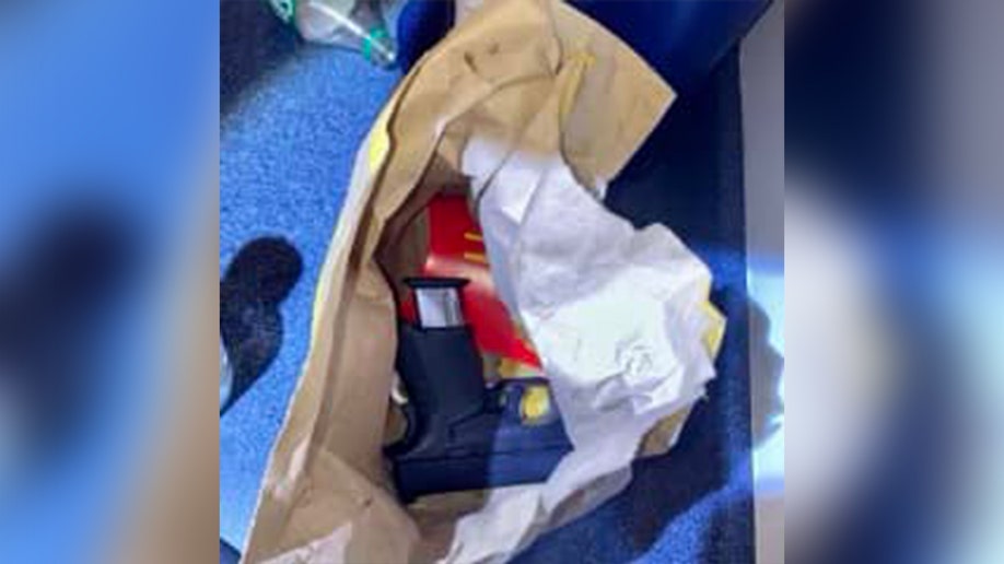 Gun in McDonald's bag