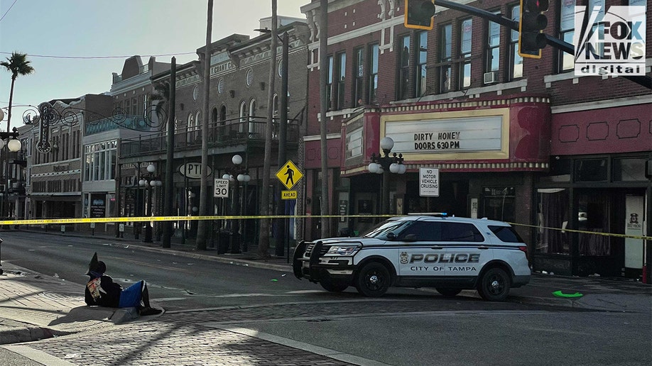 police car in taped off area