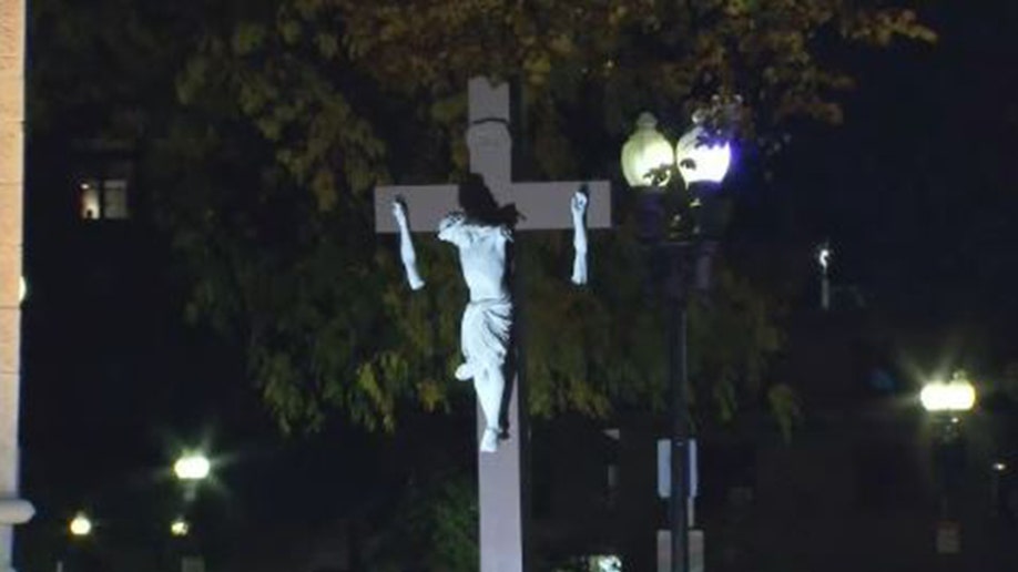Crucifix without arms outside Boston cathedral