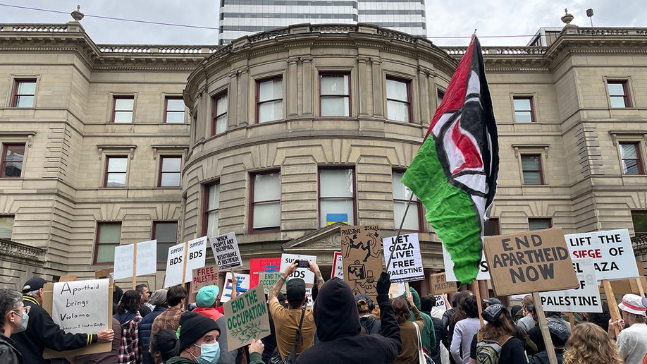 Protesters, Palestinian flags outside Portland City Hall