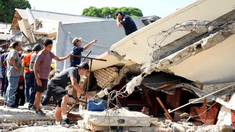 Church roof collapses while parishioners were receiving communion at child’s baptism, leaving 11 dead