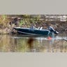 Law enforcement agents aid in the search for Robert Card along the Androscoggin River