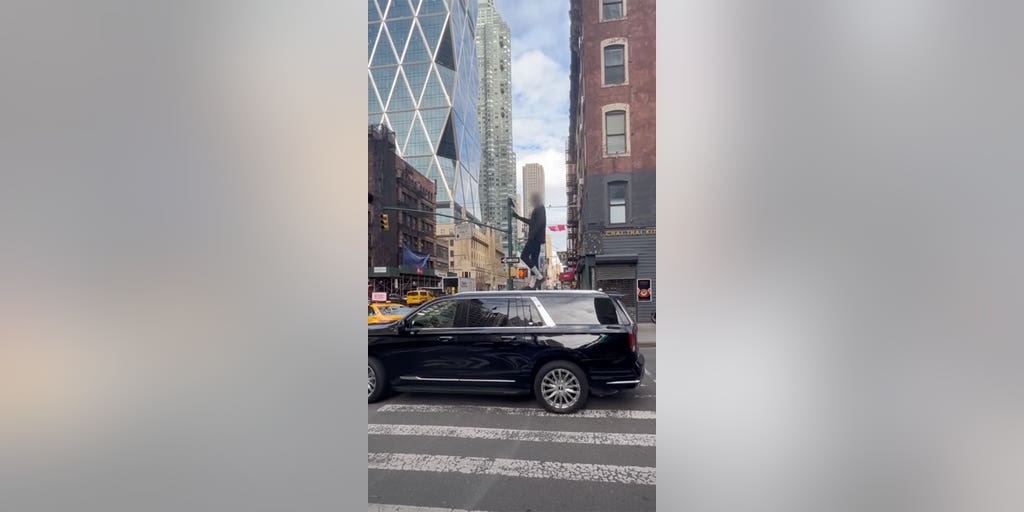 NYC carjacking suspect lies in front of bus, stands on SUV: 'He almost killed like 4 people' - Vimarsana News