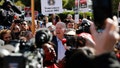 Then-2020 Democratic presidential candidate Joe Biden, center, walks in the picket line with Culinary Workers Union Local 226 Members outside of the Palms Casino Resort in Las Vegas, Nevada, U.S., on Wednesday, Feb. 19, 2020.