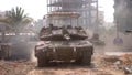 In this image taken from a video released by the Israeli Defense Forces on Tuesday, Nov. 14, an Israeli tank drives through Gaza City.