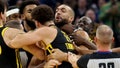 Golden State Warriors' Klay Thompson, front, and Draymond Green, back, get into an altercation with Minnesota Timberwolves center Rudy Gobert, middle, during the first half of an in-season NBA tournament basketball game in San Francisco, Tuesday, Nov. 14, 2023.
