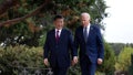 US President Joe Biden (R) and Chinese President Xi Jinping walk together after a meeting during the Asia-Pacific Economic Cooperation (APEC) Leaders' week in Woodside, California on November 15, 2023.