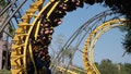 A spiraling yellow roller coaster gives riders a thrill at Busch Gardens amusement and wildlife park in Tampa, Florida. (Photo by Nik Wheeler/Corbis via Getty Images)