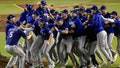 The Texas Rangers celebrate after beating the Arizona Diamondbacks 5-0 in Game Five to win the World Series at Chase Field on November 01, 2023 in Phoenix, Arizona.